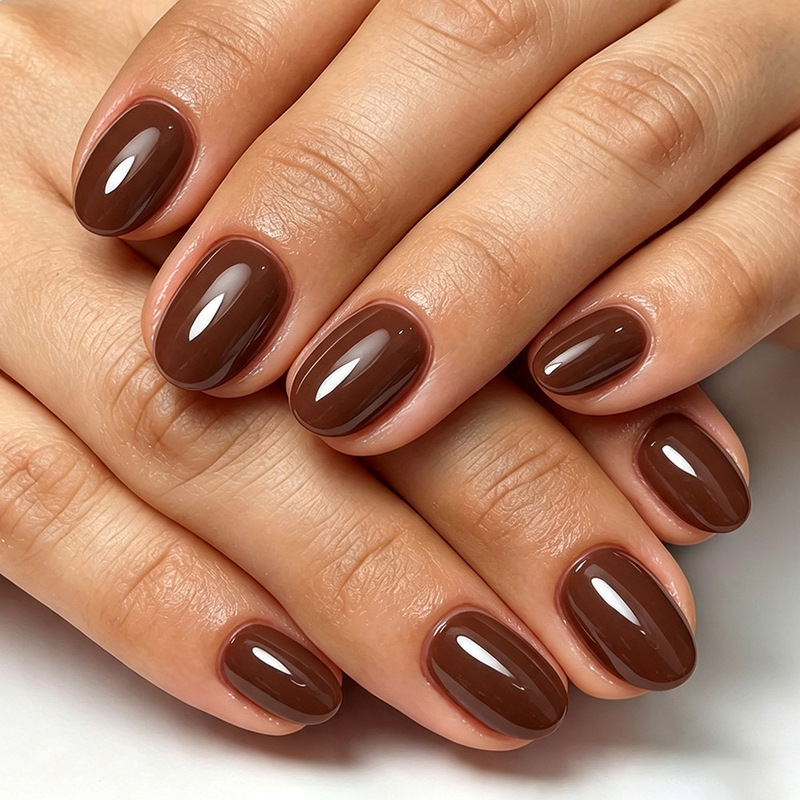 Short oval solid color glossy finished nail art in Maillard deep brown, 32 pieces of high-quality detachable fake nails Short oval solid color glossy finished nail art in Maillard deep brown, 32 pieces of high-quality detachable fake nails