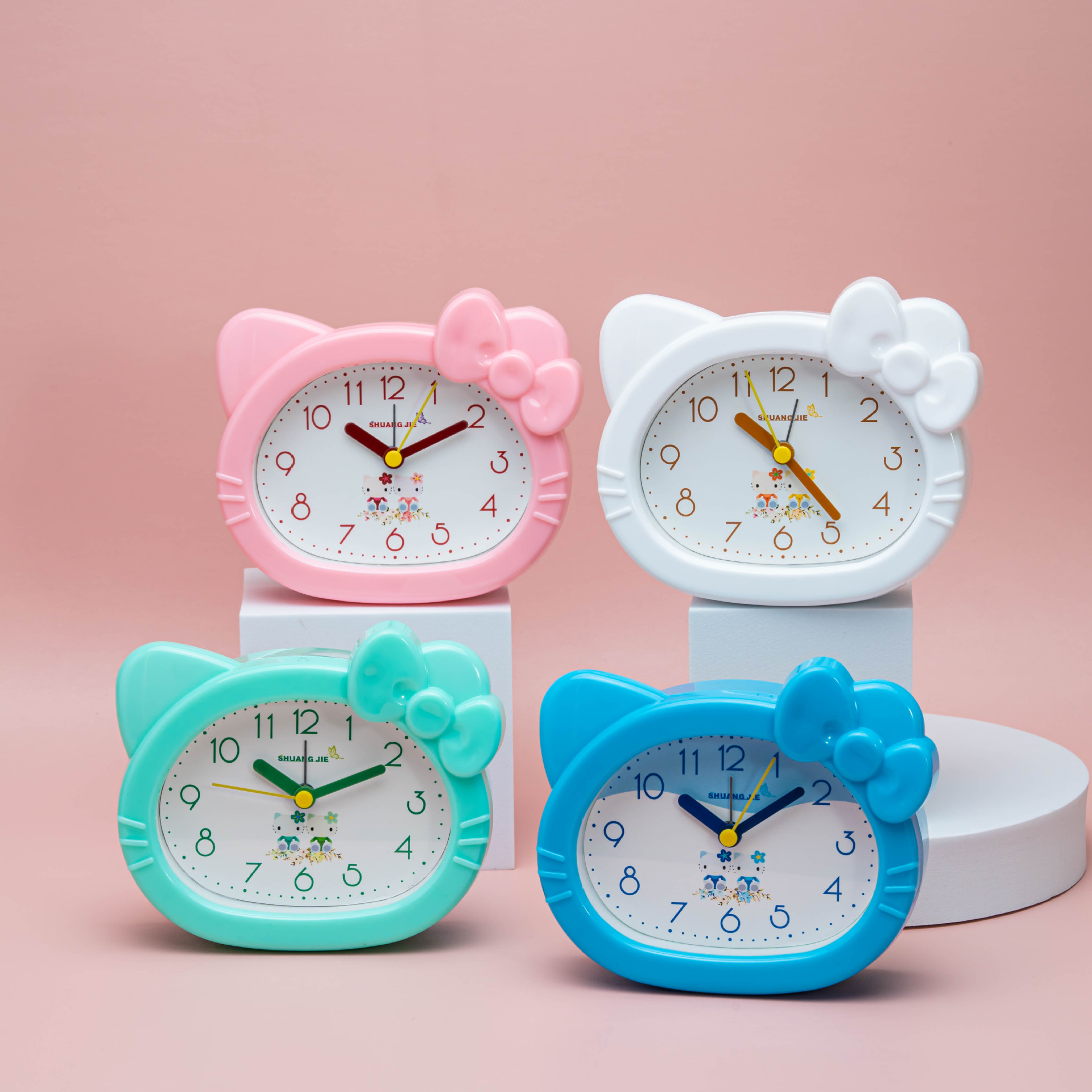 Fábrica al por mayor de dibujos animados de gato reloj de alarma estudiante creativo reloj de alarma de plástico con campana de alarma moda lindo reloj de la joyería
