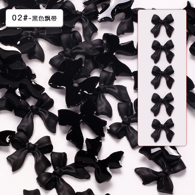 Joyas de arco de uñas al por mayor en línea explosión simple de resina joyas de uñas estereoscópicas flotantes mezcladas 50