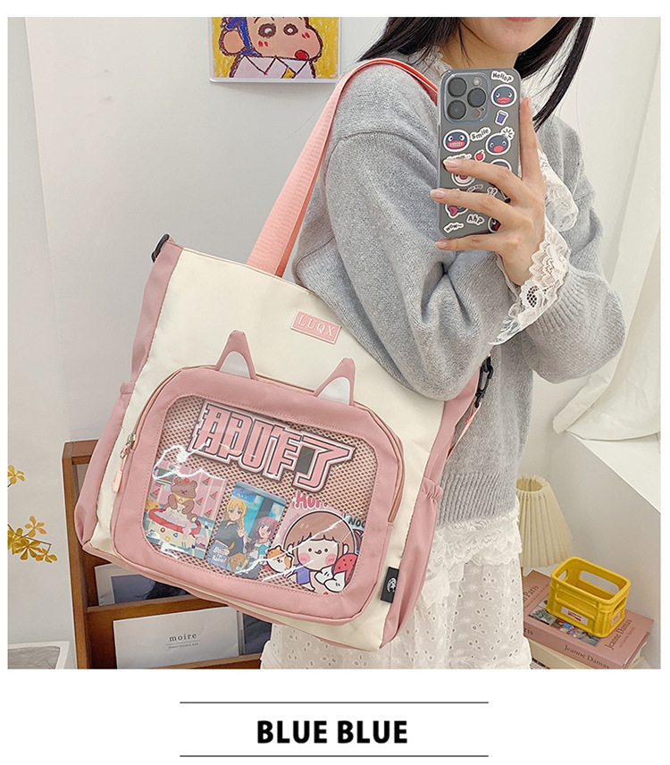 The new cute cartoon printed student bag with a large capacity and transparent student storage single-shoulder bag is selling well for women undefined