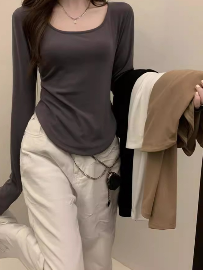 長袖tシャツの女性の秋冬の新型のファッションinsの不規則な修身の学生のカジュアルな短い上着の少女の底のシャツ