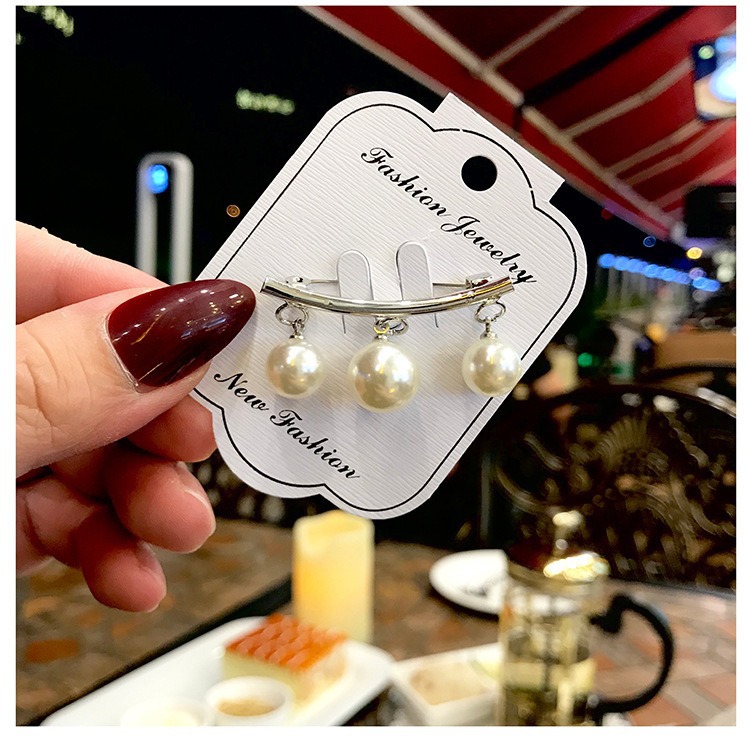 Broche de perlas broche anti-exposición ramillete ropa con hebilla de pecho pin coreano nueva fábrica creativa al por mayor