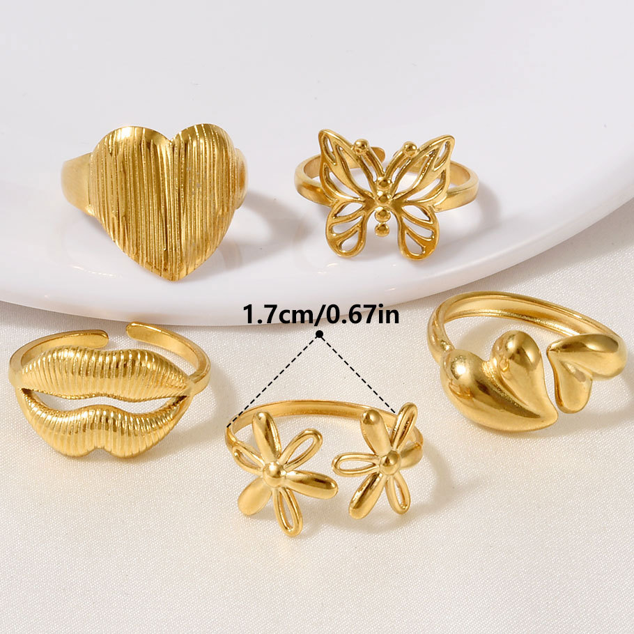 High-end Stainless Steel Couple Ring 18k Gold Hollow Pattern_voghion.com