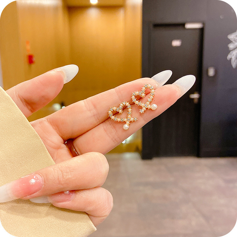 韓国風ライトラグジュアリー合金パールイヤリング レディース ロングピアス クロスボーダー卸売 高級感溢れるインスタ映えイヤリング|undefined