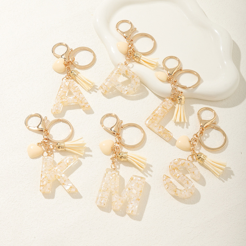 Yiwu accessories initials key chain women's bag pendant accessories lobster clasp hanging love tassel key chain cute