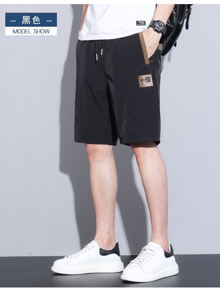 Pantalones cortos de cinco puntos para hombres de verano delgados sueltos de moda versátil pantalones casuales bordados con cremallera anti-robo pantalones rápidos de moda para hombres