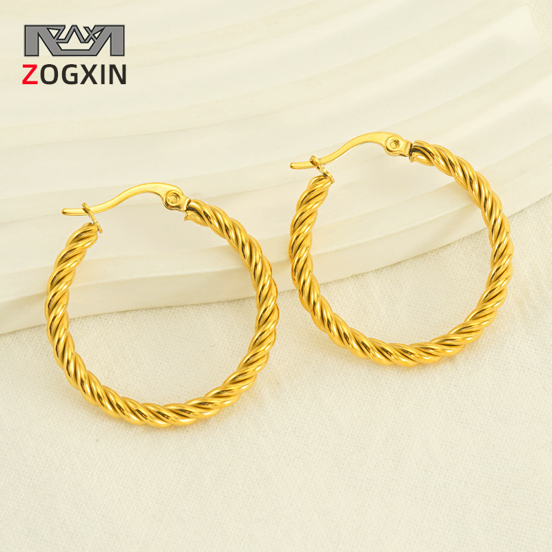 Europeo y americano 18K oro Acero inoxidable hilo giro pendientes nicho diseño transfronterizo titanio acero simple moda pendientes para las mujeres