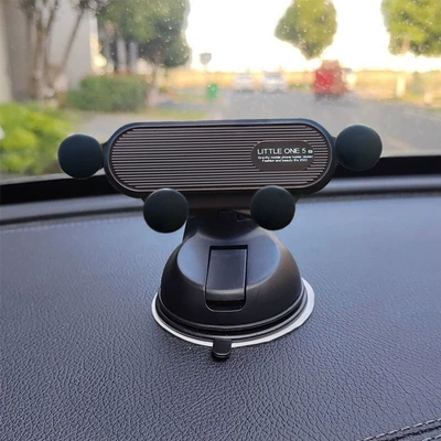 model, cartoon design for female drivers — Car phone holder - black-textured-surface-without-cartoon-design-dual-use-for-car-glass-and-dashboard