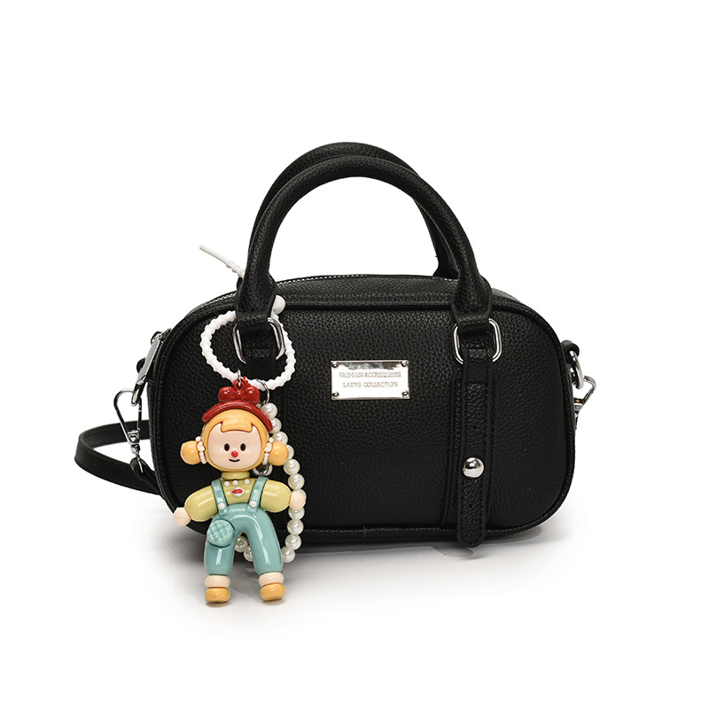 Bolso de bolera de mano de estilo explosivo para mujer 2025 nuevo bolso de hombro de estilo occidental de todo fósforo bolso de mensajero de paso de moda de alta gama