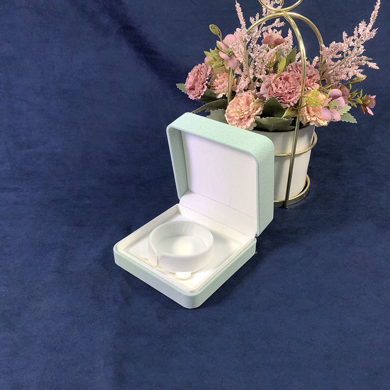 Cubierta de ángulo redondeado fresco caja de joyería de cuero PU caja de embalaje de joyería de moda anillo brazalete embalaje de joyería