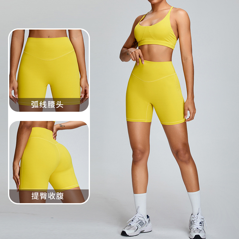 Pantalones cortos de yoga transfronterizos de las mujeres Peach Levantamiento de la cadera pantalones de yoga contracción del vientre Pantalones deportivos de cuatro puntos ajustados pantalones cortos de fitness para correr