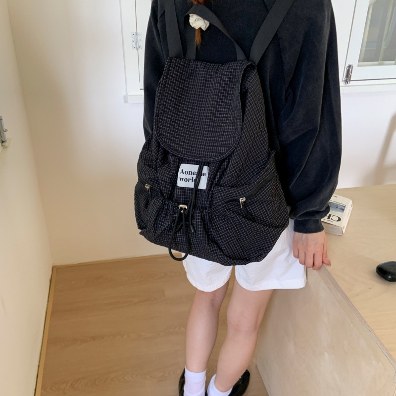 Mochila de color sólido ligero de gran capacidad casual, bolso de mujer a cuadros con cordón, mochila escolar para estudiantes de moda callejera de todo fósforo
