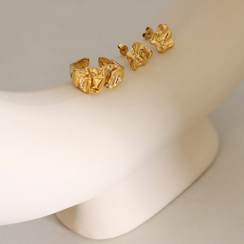 Temperamento retro de las mujeres estilo coreano personalizado diseño de nicho en relieve elegante anillo cóncavo-convexo pendientes traje de joyería