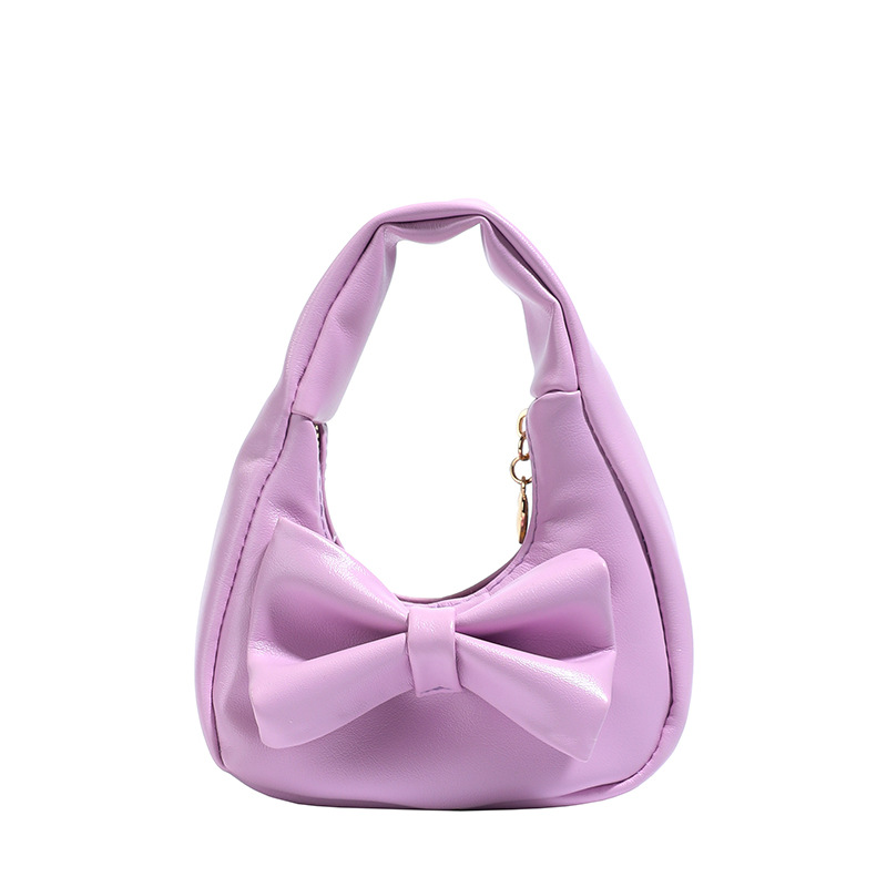 Dolce y lindo arco bolso de niña exquisita mini bolso de cambio de bebé 2025 bolso infantil transfronterizo