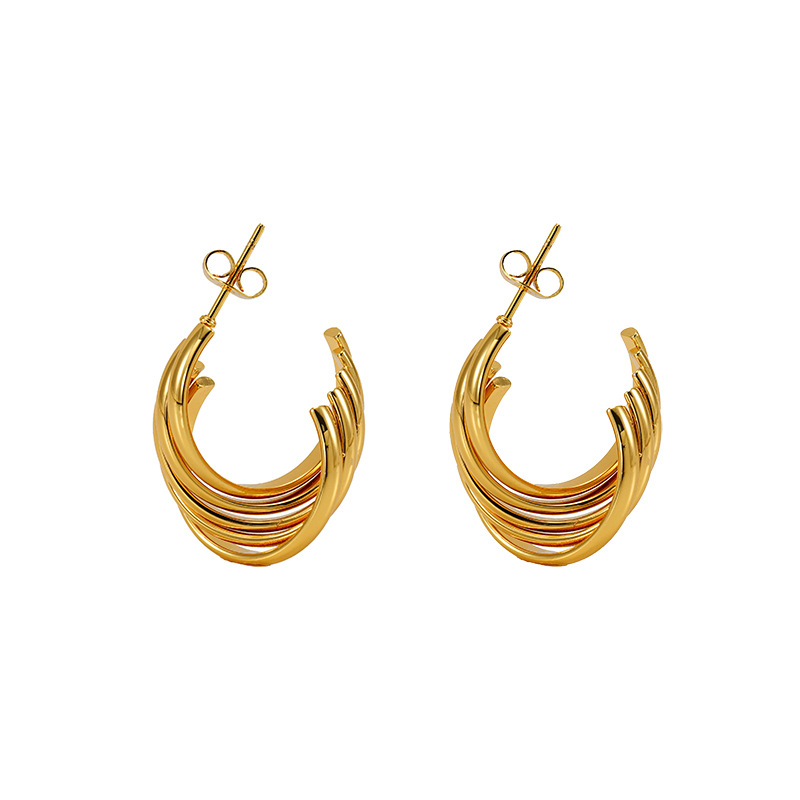 Pendientes de giro geométrico retro al contado de nuevo estilo Pendientes de anillo de acero de titanio de temperamento dorado de 18 quilates de moda