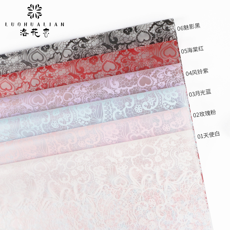 Al por mayor nuevo tipo de flores amor hansu papel floral material de embalaje de flores engrosado patrón impermeable ramo de papel de embalaje