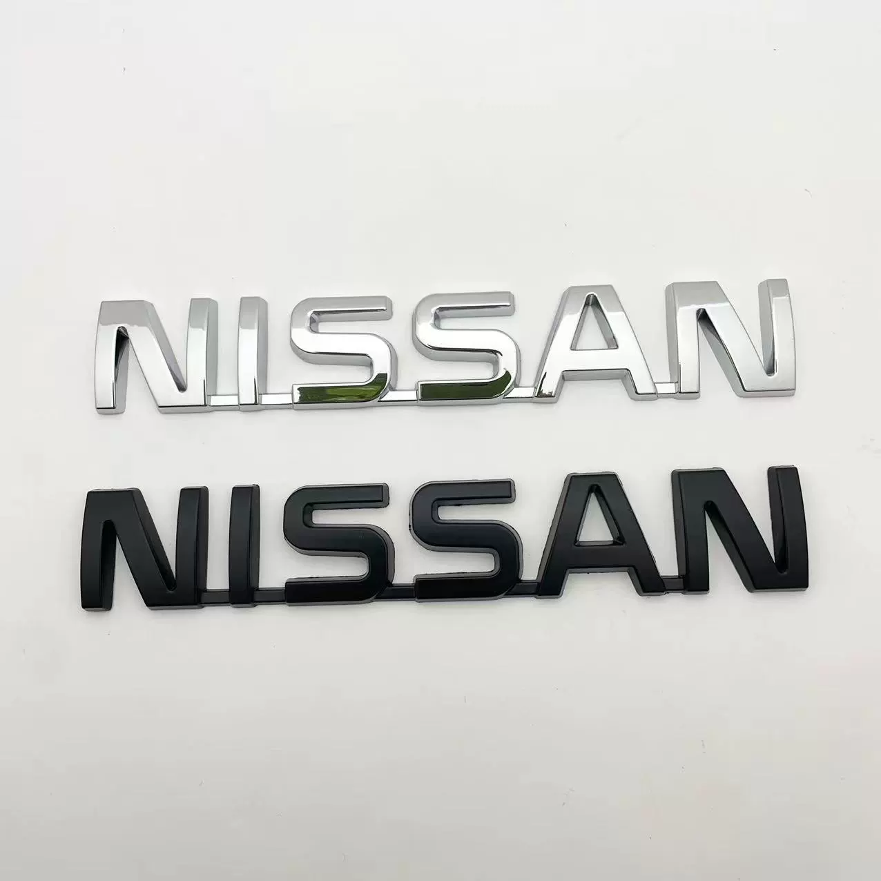 Применимо к Nissan NISSAN Weiwei Toule Qashqai Tianta Xuanyi Nisang логотип металлическая наклейка автомобиля