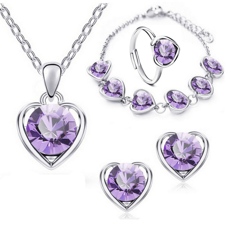 Venta caliente transfronteriza joyería en forma de corazón de cristal traje personalidad femenina temperamento corazón collar pendientes anillo pulsera conjunto de cuatro piezas