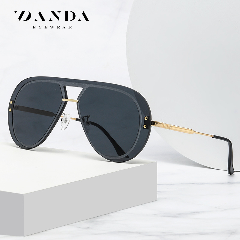 Nuevas gafas de sol transfronterizas JS8521 de los hombres de moda de una sola pieza sin marco gafas de sol al aire libre de conducción clásica Rana gafas