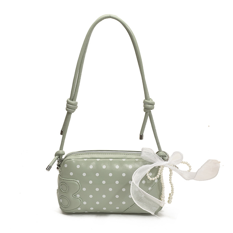 Bolso de moda coreano 2025 verano nuevo bolso femenino bolso de hombro de punto de onda de estilo extranjero celebridad de Internet bolso de mensajero del mismo estilo marea