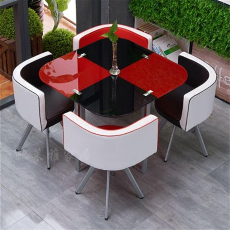 Mesa y sillas de comedor modernas, mesa redonda pequeña de vidrio templado, mesa y sillas para recepción y negociación, una mesa y cuatro sillas, cocina de inducción.