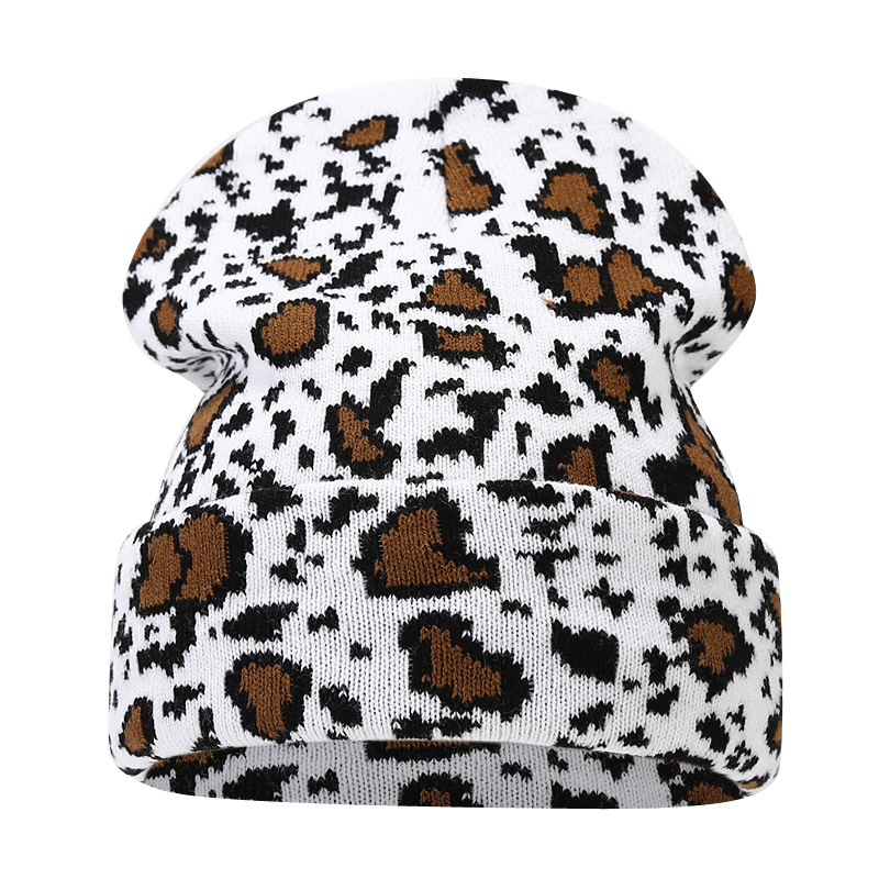 Moda europea y americana Nueva leopardo Jacquard sombrero de punto engrosado cálido hombres y mujeres otoño e invierno Gran circunferencia de la cabeza protección del oído sombrero de lana