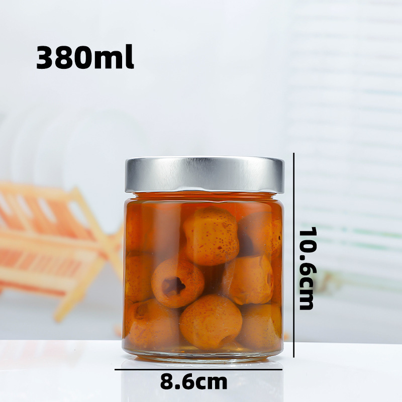 Fabricantes al por mayor botella de miel de tapa alta botella de vidrio de encurtidos redondos olla de almacenamiento de encurtidos de cocina botella de salsa de carne de res con salsa de chile