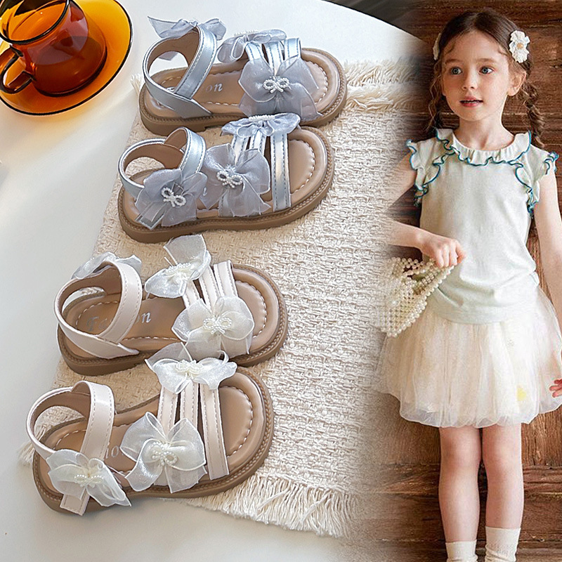 Sandalias para niños verano 2026 nueva moda de chicas zapatos princesa de moda de chicas zapatos de playa huecos de arco