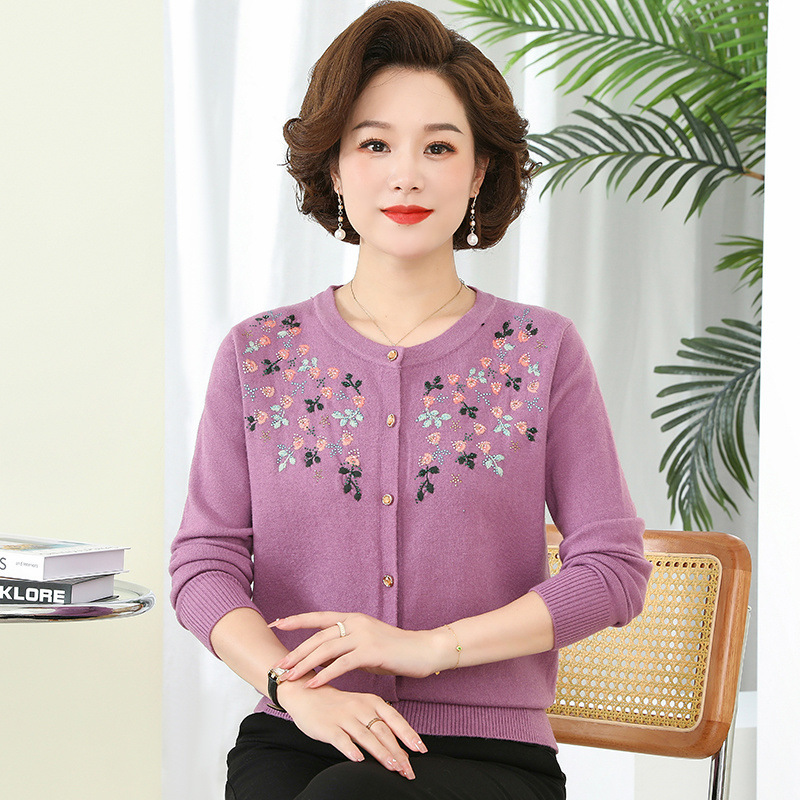 Thin knitted sweater with a round collar