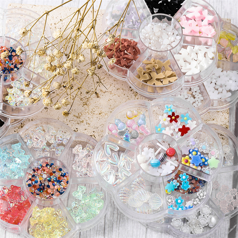 Venta al por mayor joyería de uñas arco Aurora oso mariposa rhinestone perla mixta conjunto caja decoración de uñas accesorios de diamantes