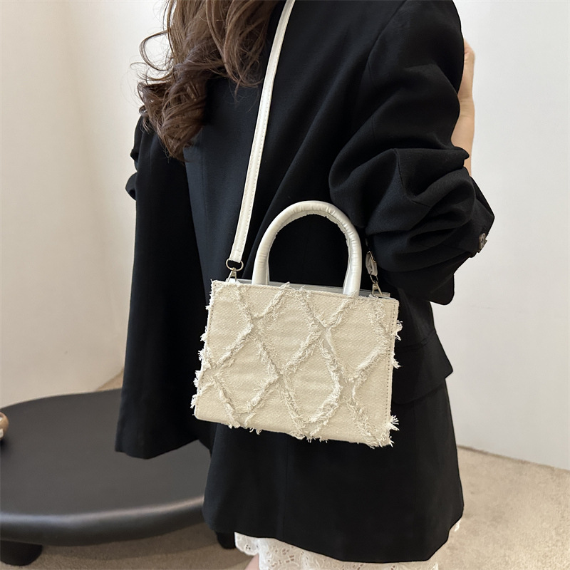 Bolso de moda de moda de Internet para mujeres 2024 nuevo estilo de moda de verano bolso de hombro portátil de mujer bolso de mochila jeans versátil