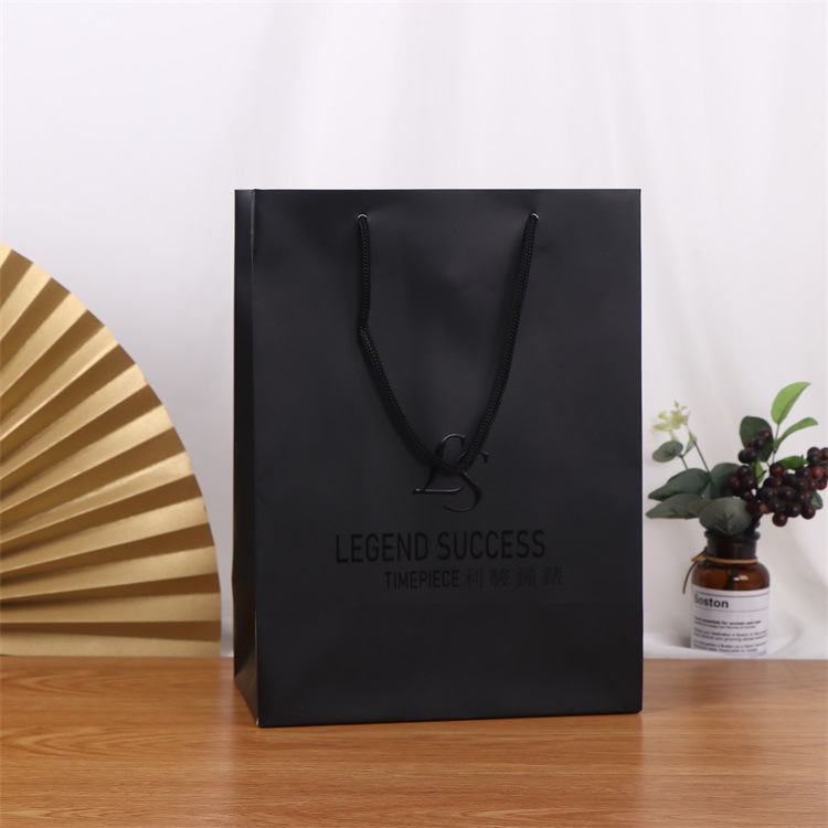 厂家批发礼品牛皮纸袋 服装包装袋 女装购物手提袋来图设计logo