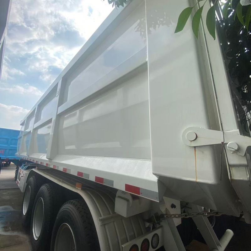 Rear-tipping self-unloading semi-trailer with front-mounted hydraulic cylinder, air-suspended single-tire lifting axle, sand and gravel transport vehicle, sourced from Central Asia