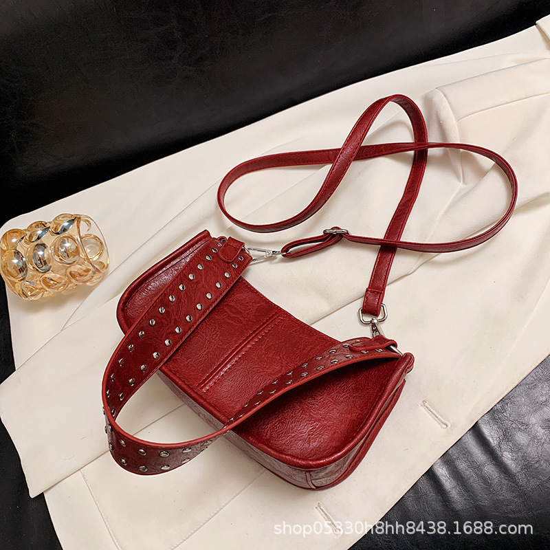 Bolso de moda ins de personalidad de nicho para mujer 2024 bolso de bola de masa láser brillante de otoño bolso de hombro de alta gama