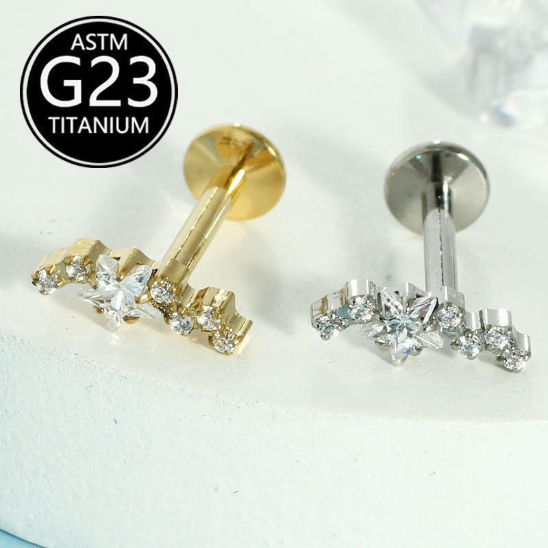 Silver pointed spike labret stud material detail