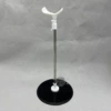 Features 3-point black stand with thick rubber base