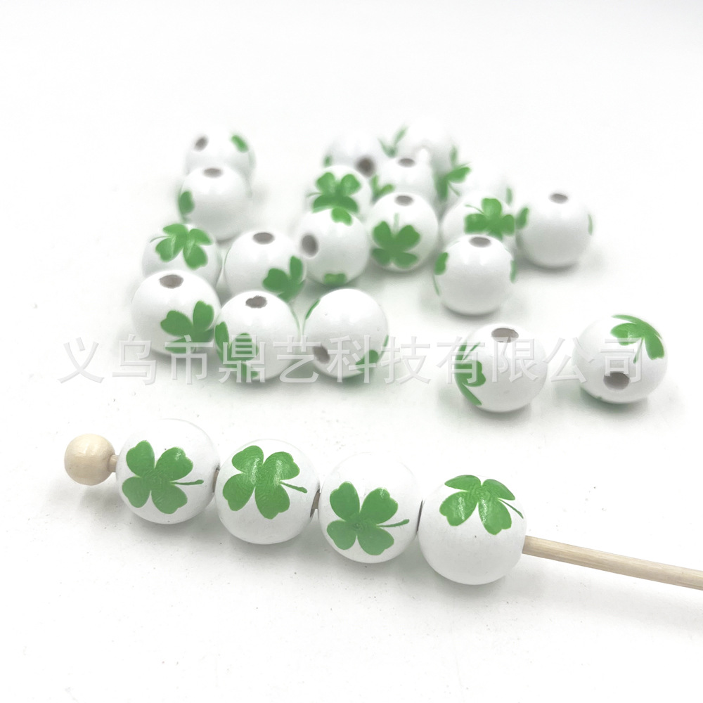 卸売りプリント木珠アイルランド日木珠クローバー四葉草形散珠diyビーズアクセサリー部品