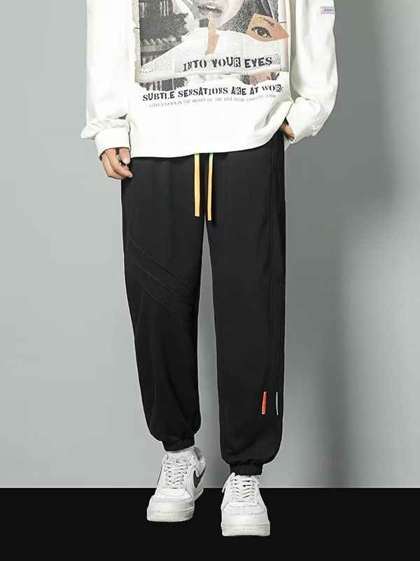 2024 primavera y otoño nuevos pantalones casuales para hombres de moda juvenil marca holgada pantalones deportivos de moda de moda