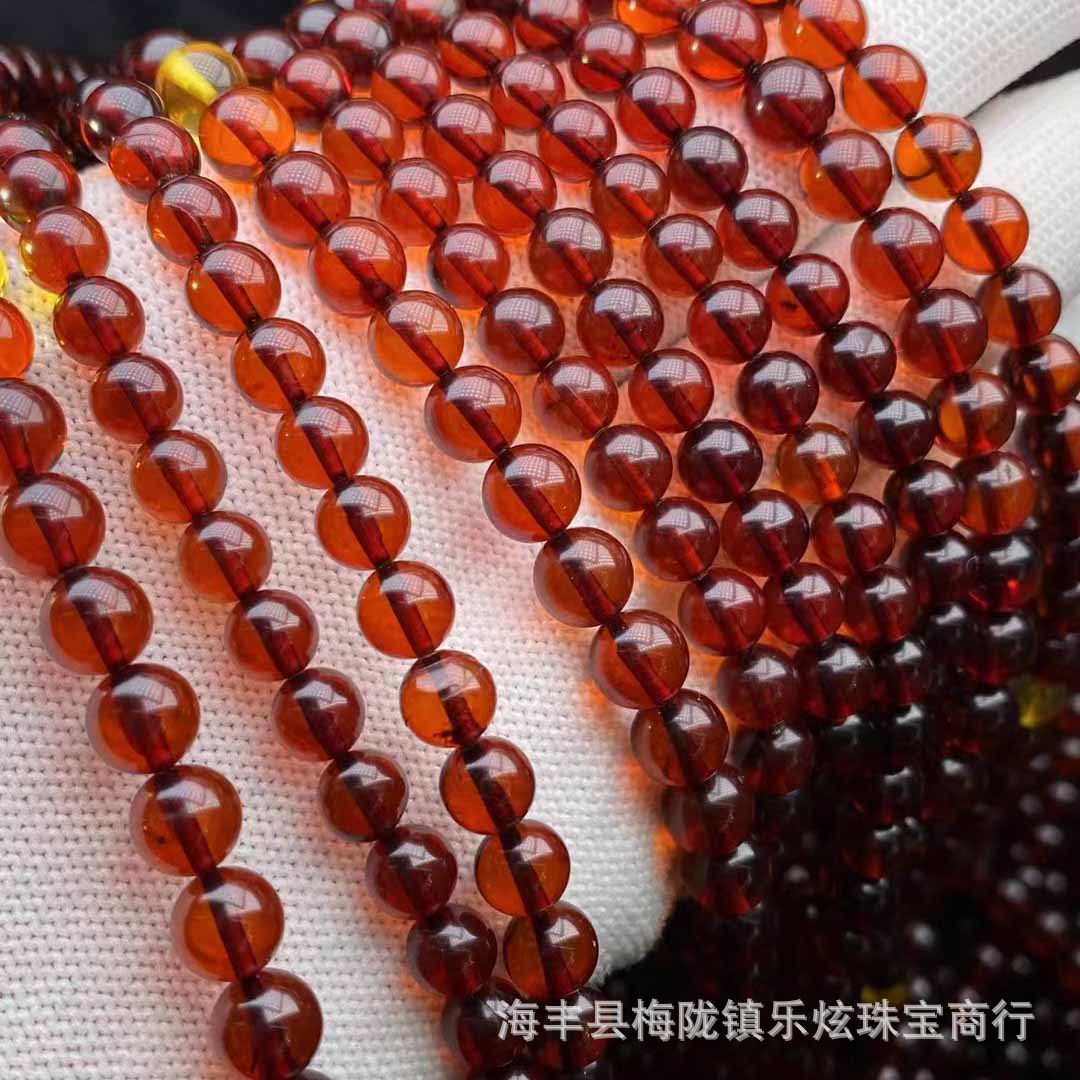 原矿琥珀蜜蜡血珀散珠半成品批发 酒红色3A净水血珀108佛珠手串