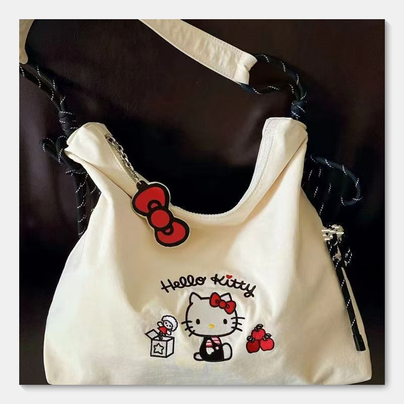 かわいい漫画キティ刺繍キャンバスバッグ女性のための 2025 新しい大容量通勤トートバッグシングルショルダークロスボディバッグ|undefined