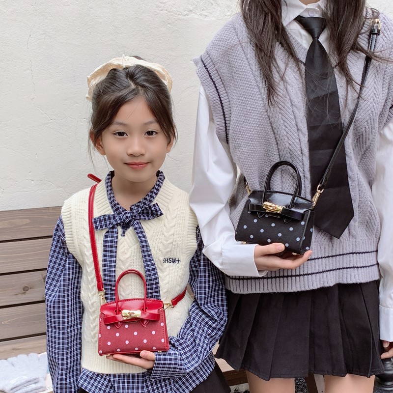 2025 nuevo paquete japonés y coreano de ondas para niños, mini bolso para bebés de alto valor, bolso de moda para padres e hijos