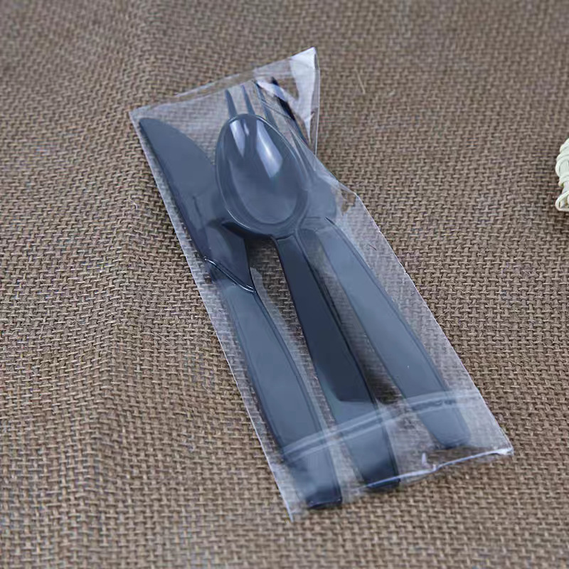 使い捨てナイフとフォークの軽食は長い柄の果物とフォークの透明な西洋料理のパスタのプラスチックのフォークを厚くして、単独でティッシュを詰めます。|undefined