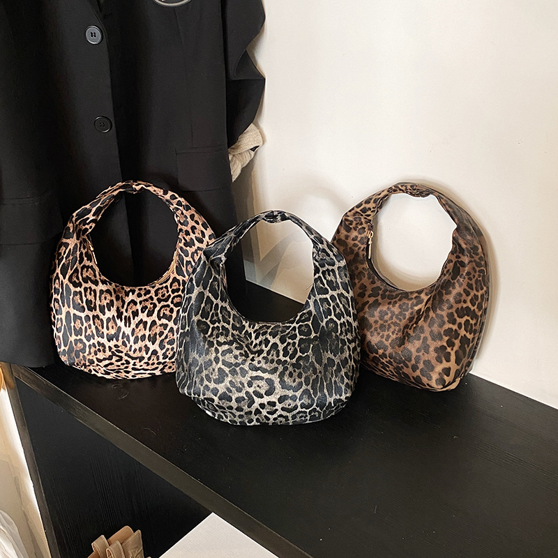 2025 primavera nueva moda gran capacidad perezoso viento brazo mochila estampado leopardo viaje bolsa de moda