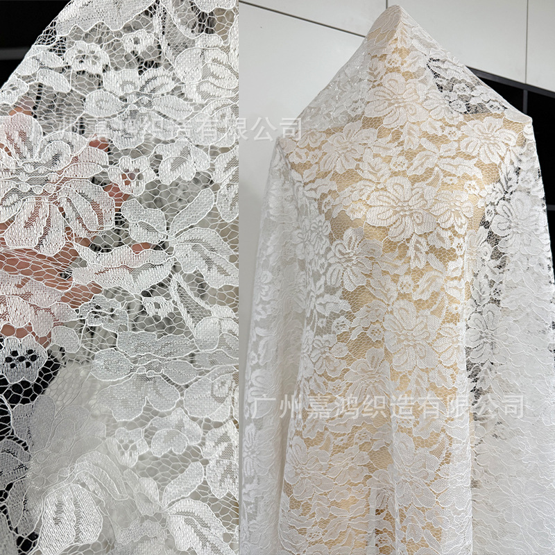 Tejido de encaje de primavera y verano, encaje de hebra, tejido de encaje de poliéster ligero y delgado, se puede procesar para hacer un vestido de acolchado.