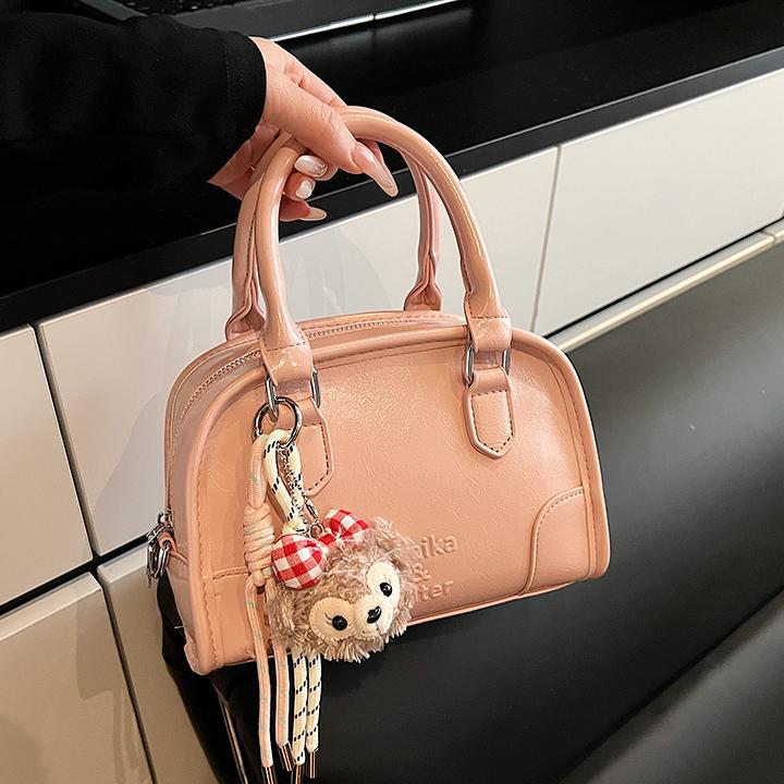 Bolso de béisbol de mano popular de este año para mujer 2025 nuevo bolso de hombro casual de todo fósforo bolso de mensajero de moda de alta gama
