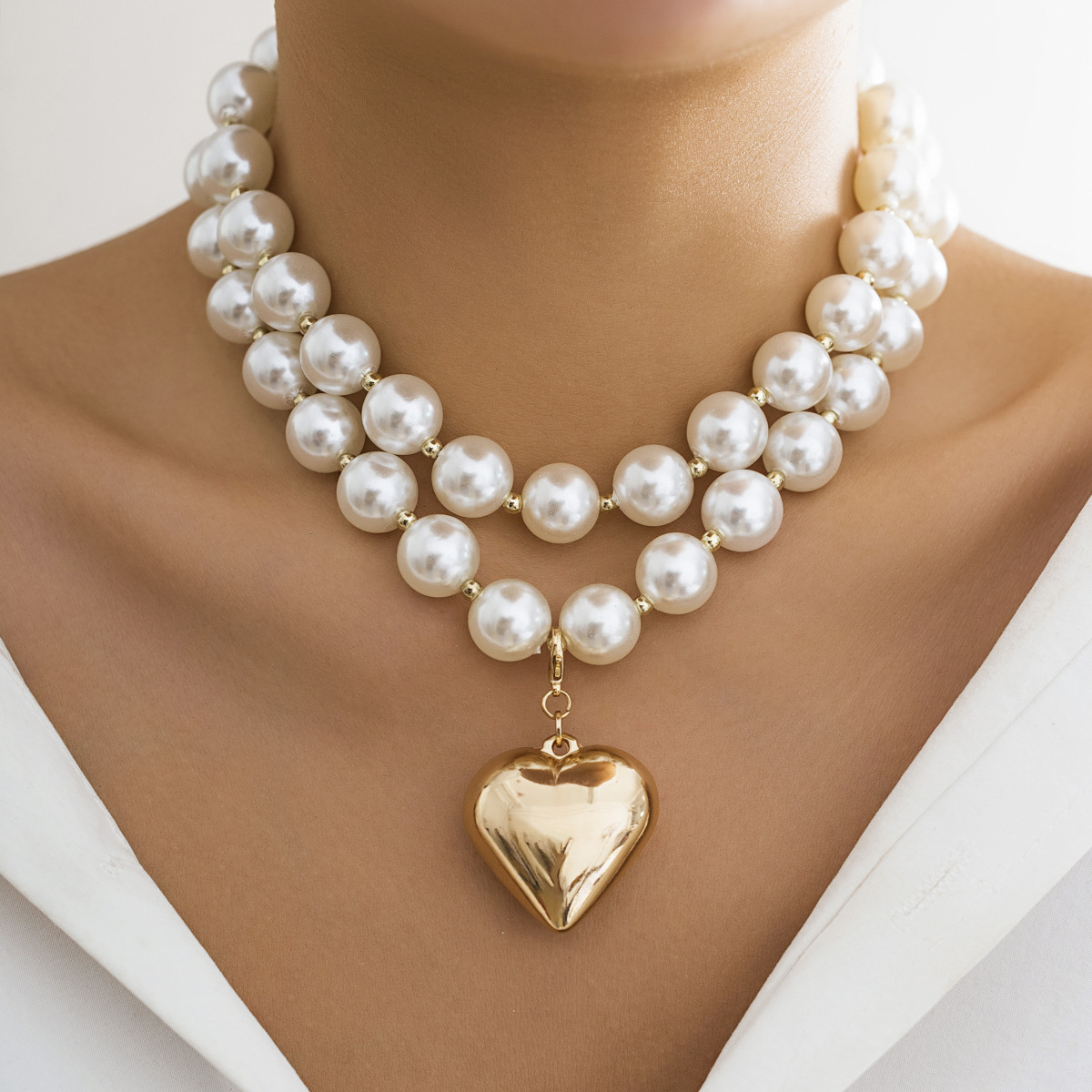 Elegant Exaggerated Geometric Heart Shape Ccb Imitation Pearl Beaded Plating Women's Necklace display picture 11