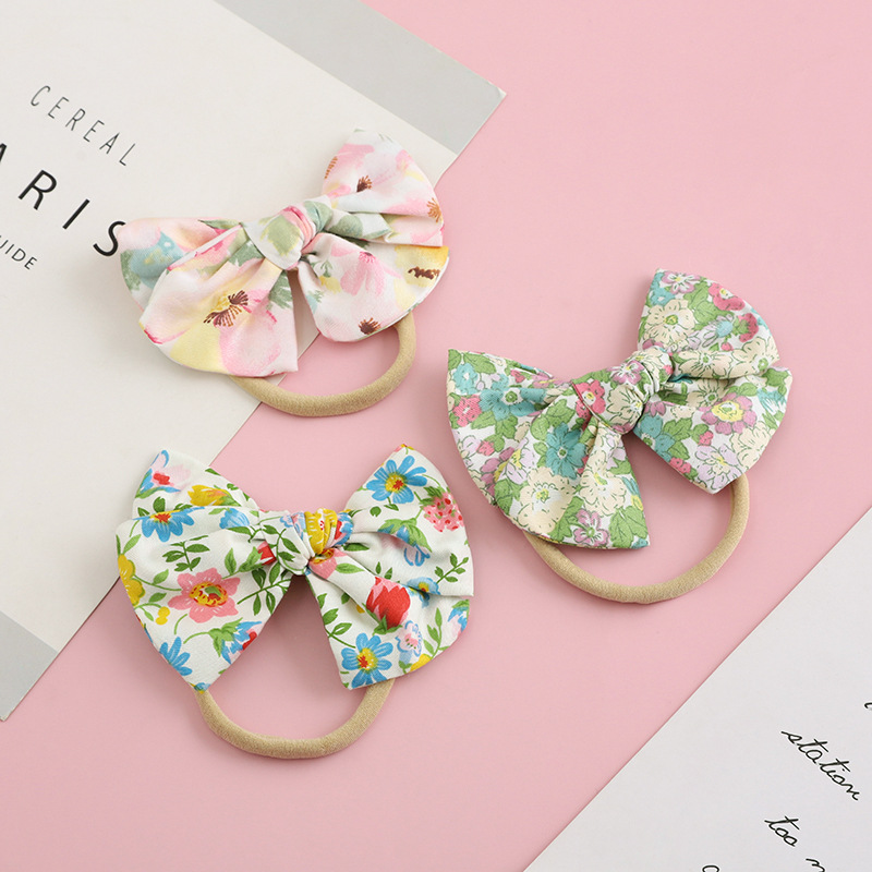 Spring Bow Cotton Floral Headband Baby Nylon Baby Soft Hair Rope display picture 3