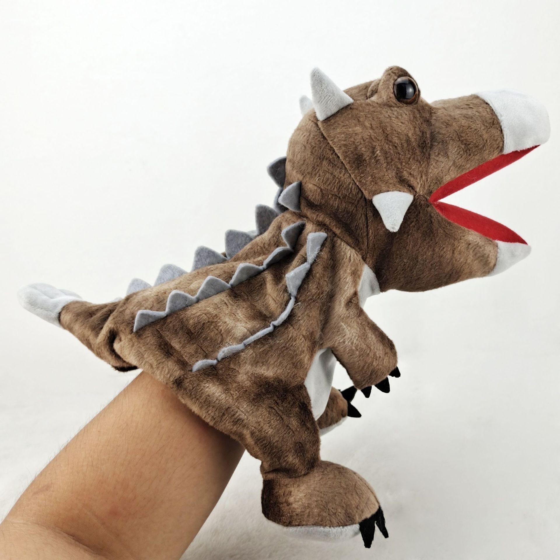 Dragón año dinosaurio en stock juguete de peluche Canglong animal educativo muñeca de títeres kindergarten historia contando apoyos muñeca