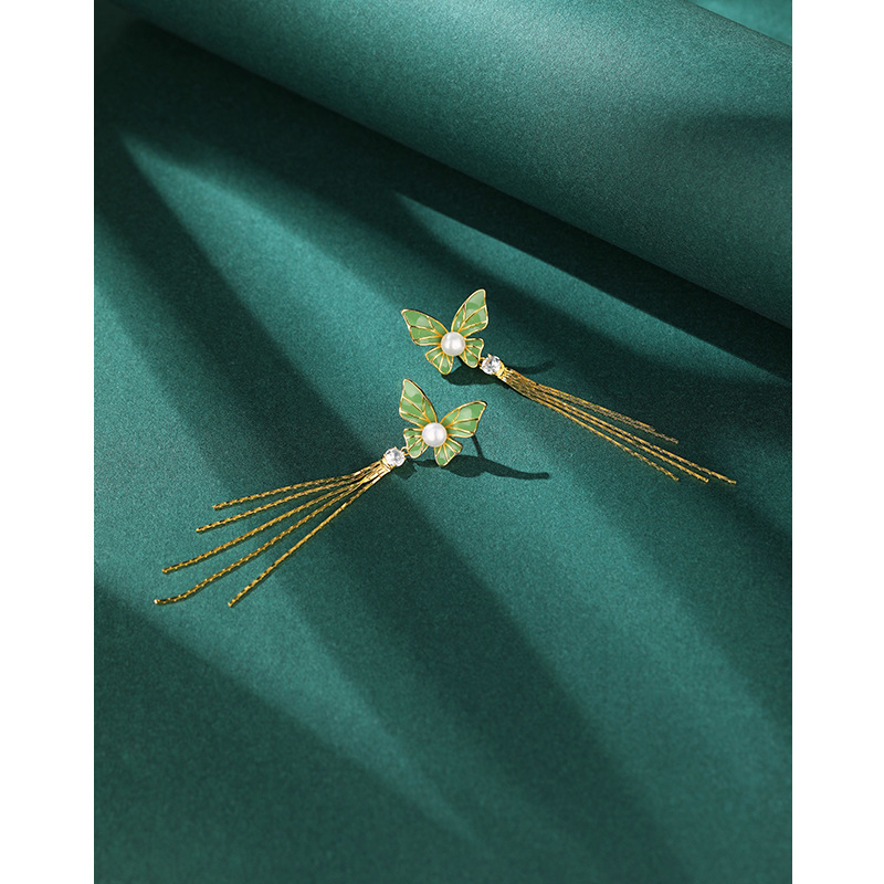 Japonés y coreano s925 plata ZIRCON pendientes moda gota aceite mariposa perla pendientes largos borla pendientes fábrica suministro directo