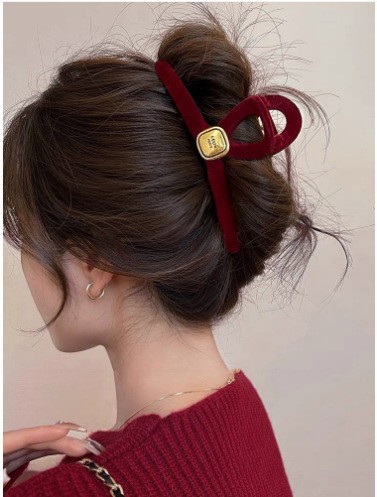 Burgundy velvet with gold cross detailing